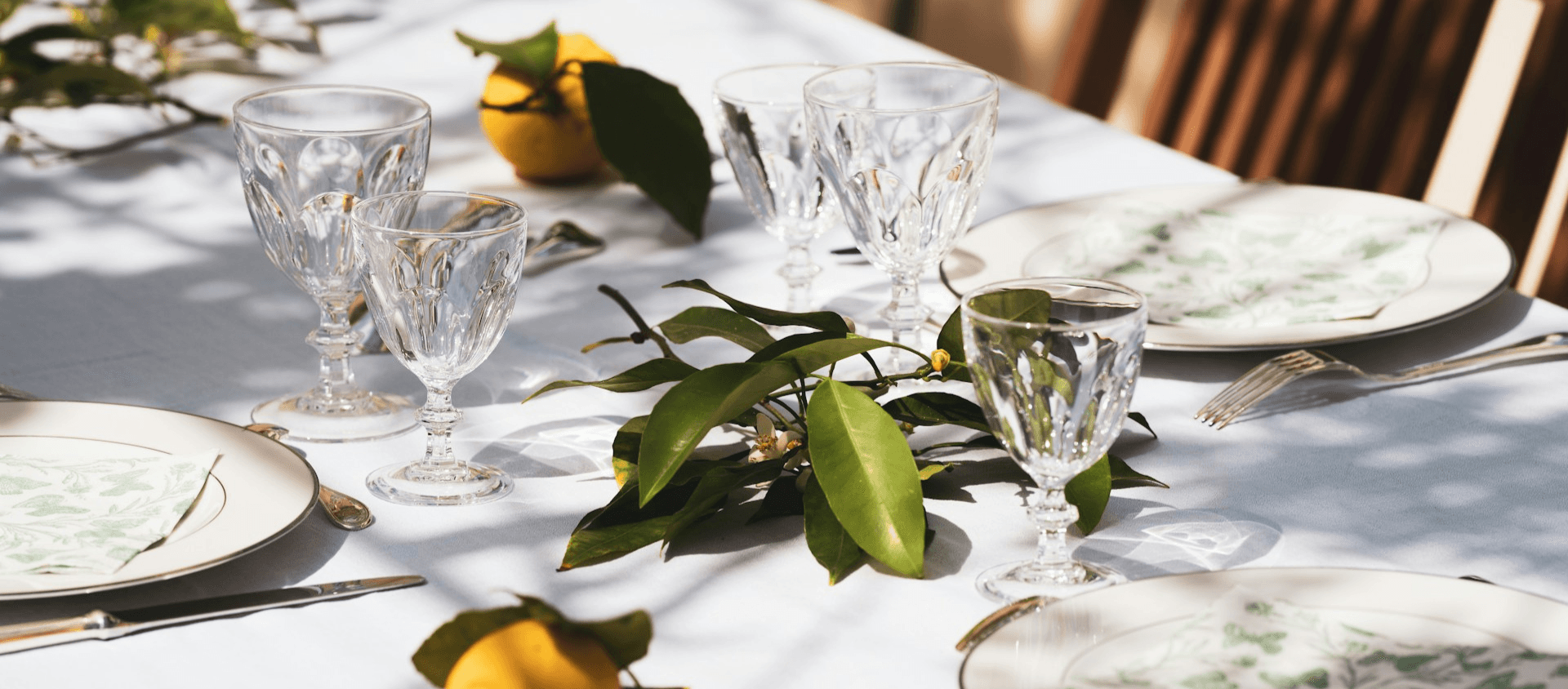 Elegant vintage table setting for backyard engagement