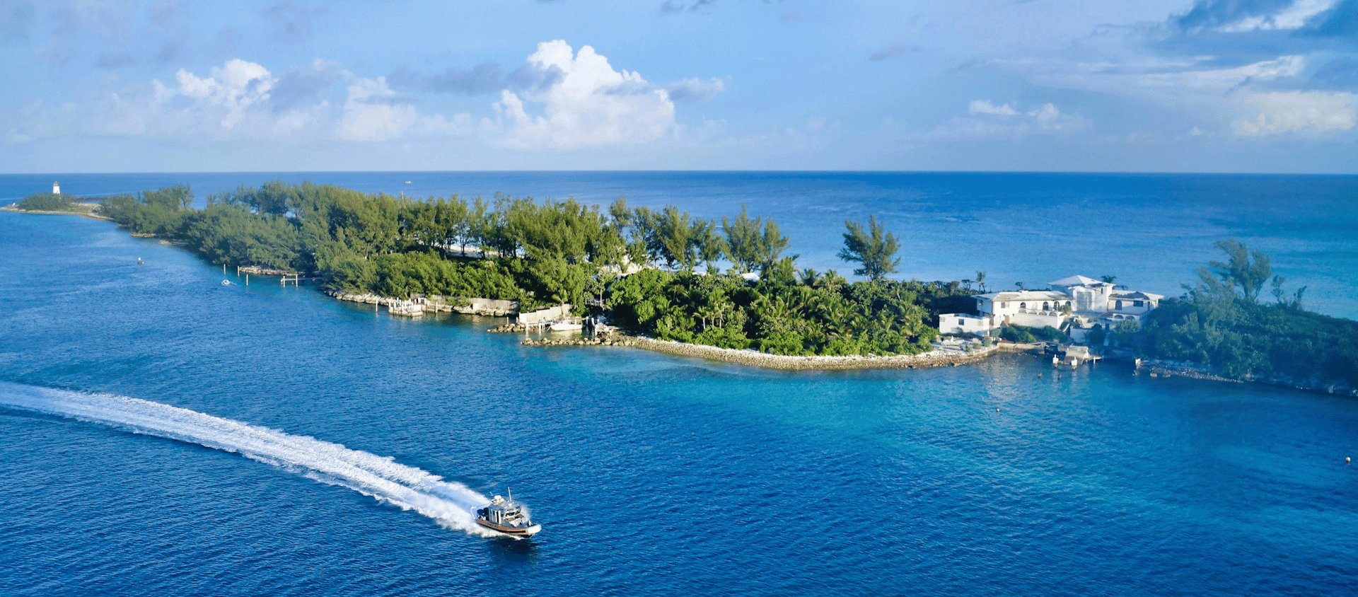 Private island and turquoise waters in the Exumas, Bahamas
