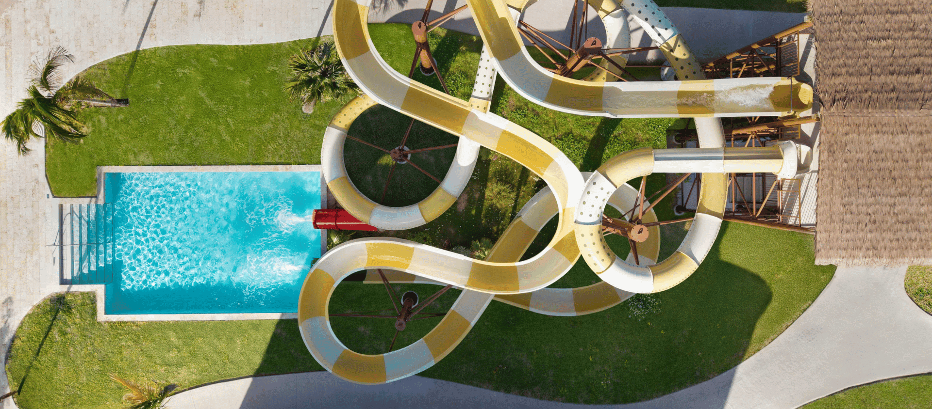 Aerial view of the waterslide and pool complex at Dreams Playa Esmeralda.