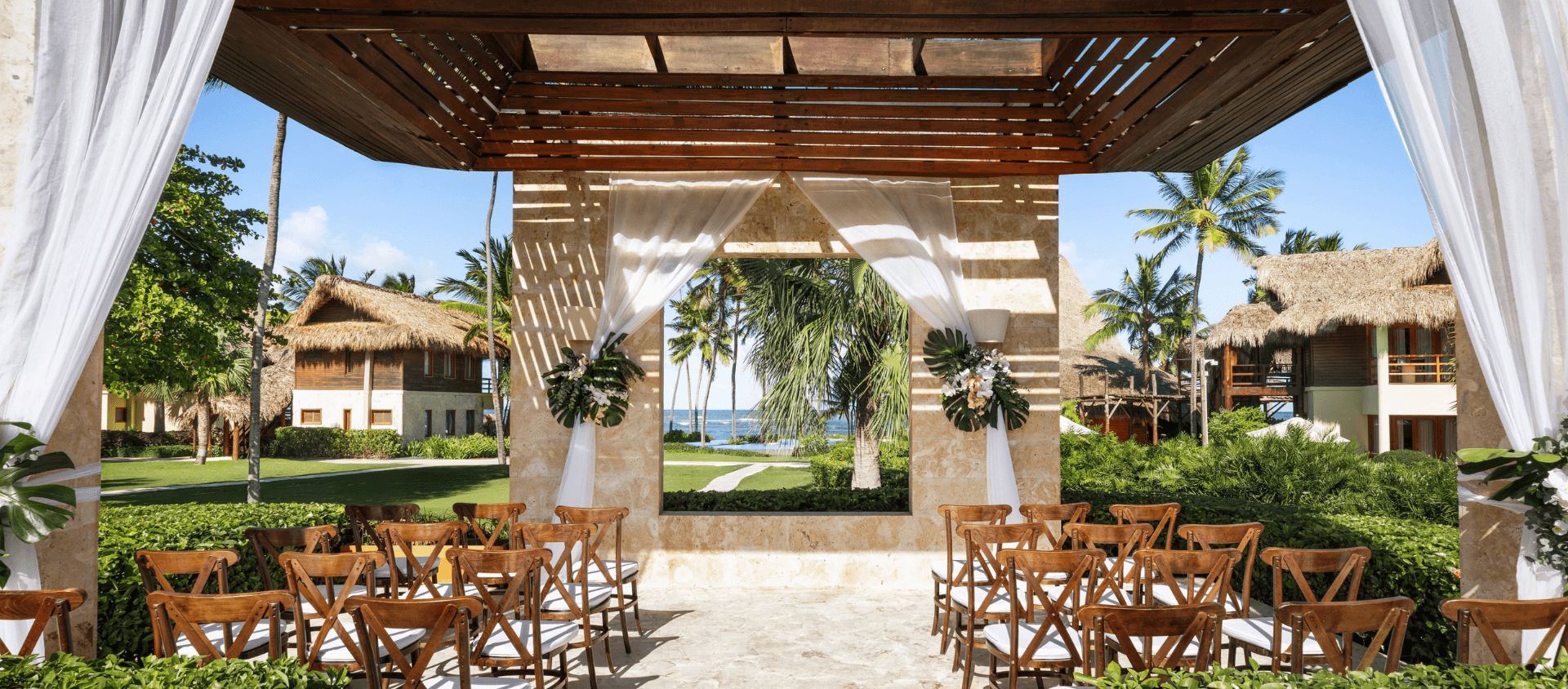 wedding alter and guest chair setup on tropical resort