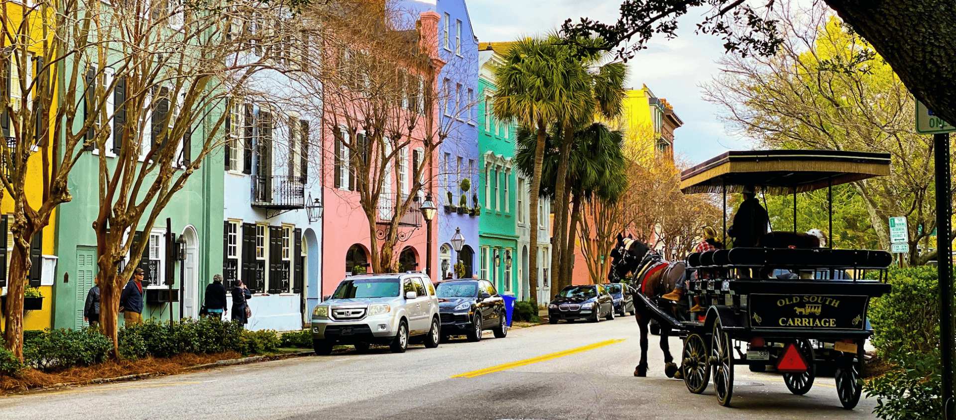 People riding on a carriage during the daytime in Charleston, SC