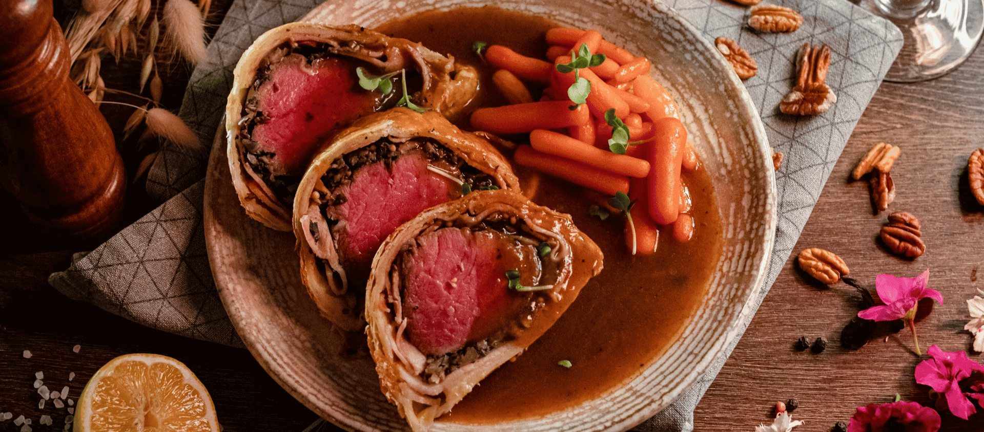 Beef Wellington sliced and cooked to perfection with a pastry crust.
