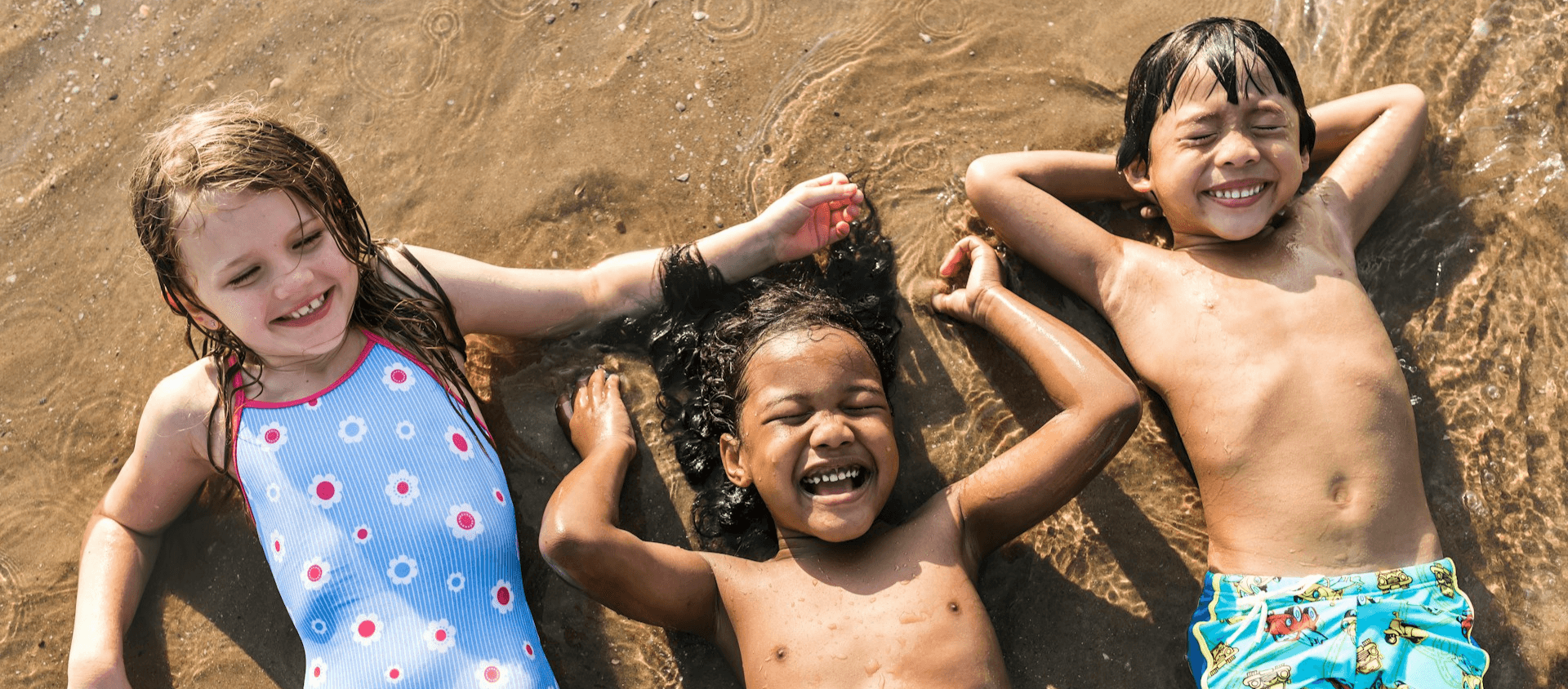 Kids playing at the beach