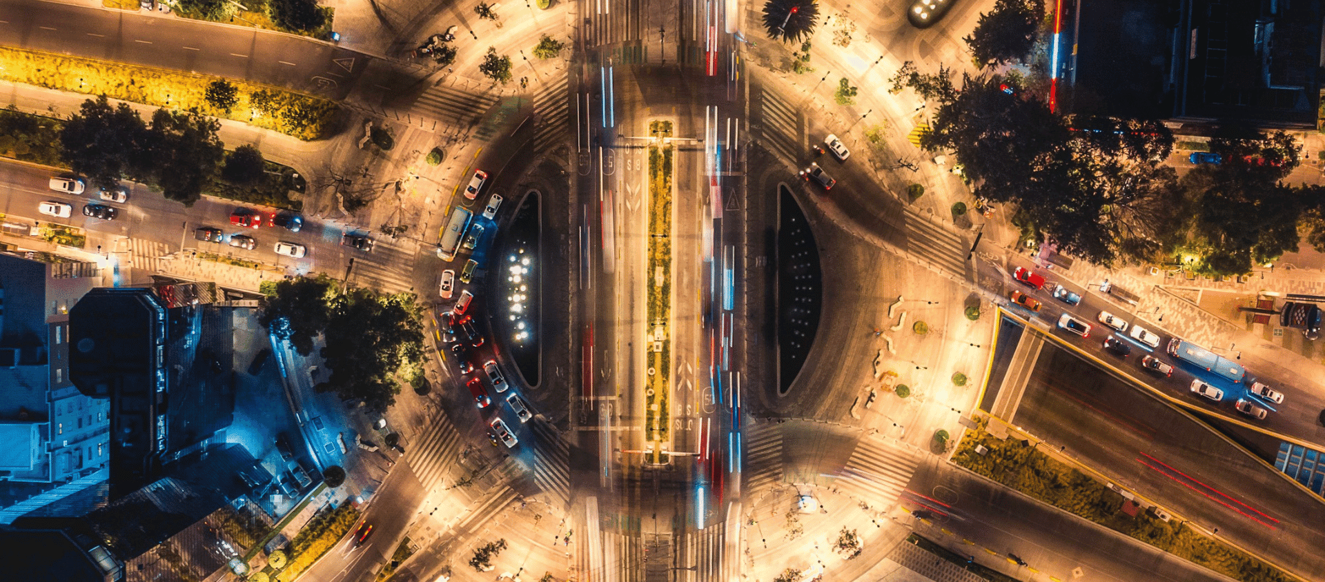 Aerial night view of a lit-up boulevard in Mexico City.