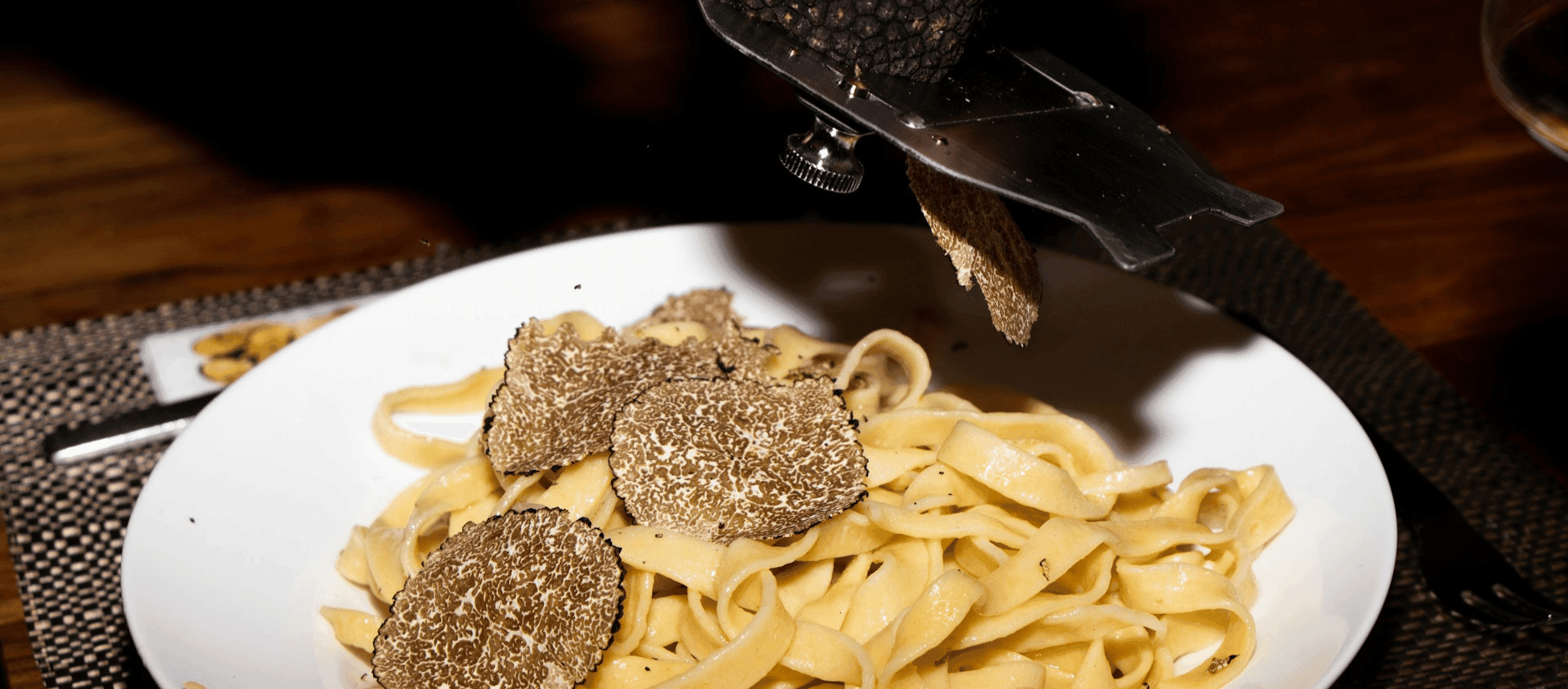 Truffle pasta topped with shaved truffles.