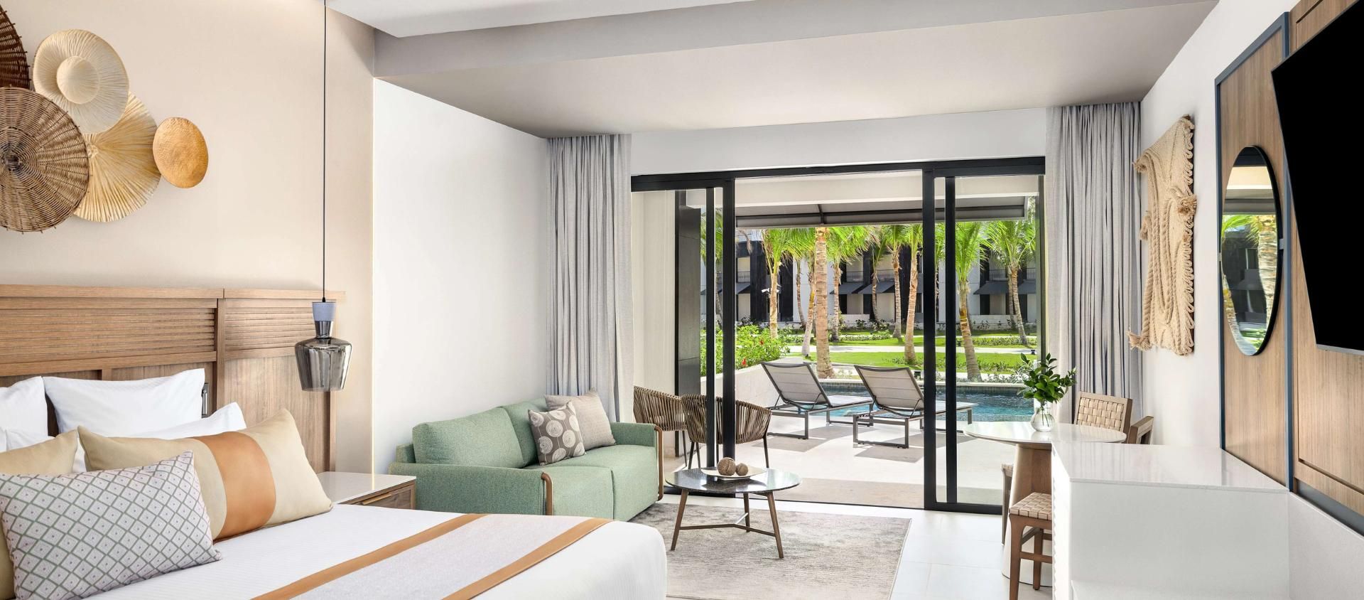 Swim-out suite bedroom opening onto a semi-private pool at Secrets Tides Punta Cana.