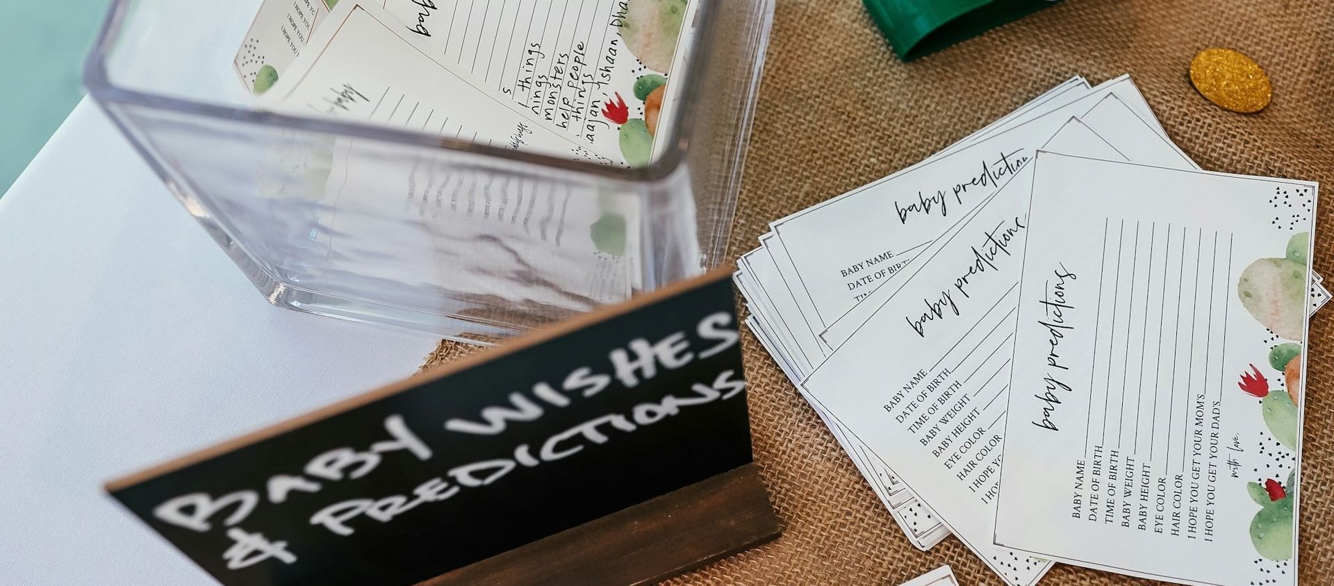 A baby wishes and predictions card station at a baby sprinkle.