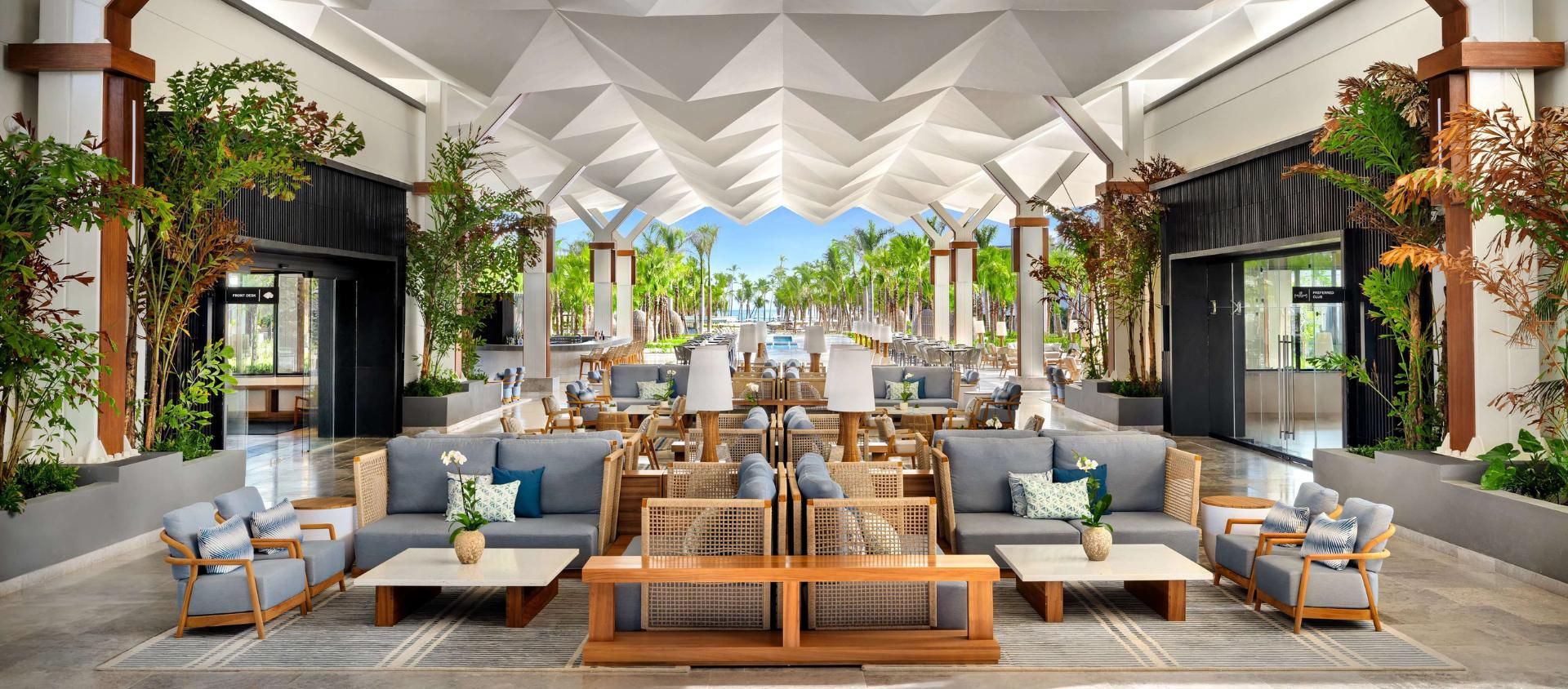 Open-air lobby lounge with ocean views at Secrets Tides Punta Cana.