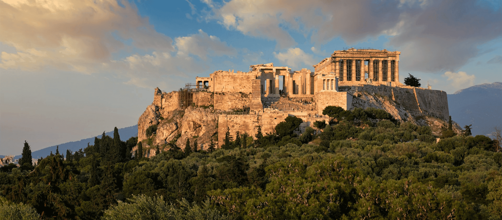 The Parthenon on the Acropolis in Athens, Greece at sunset.