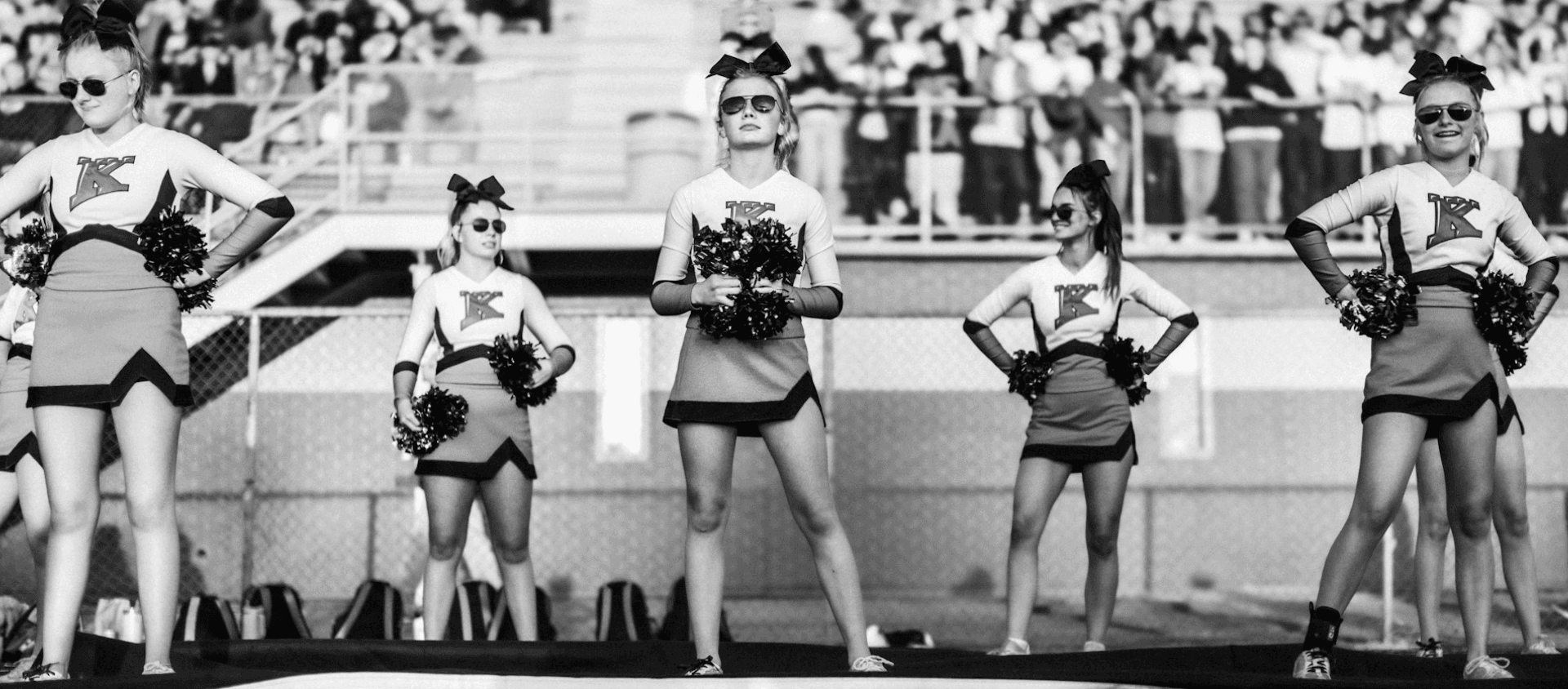 High school cheer team at a football game