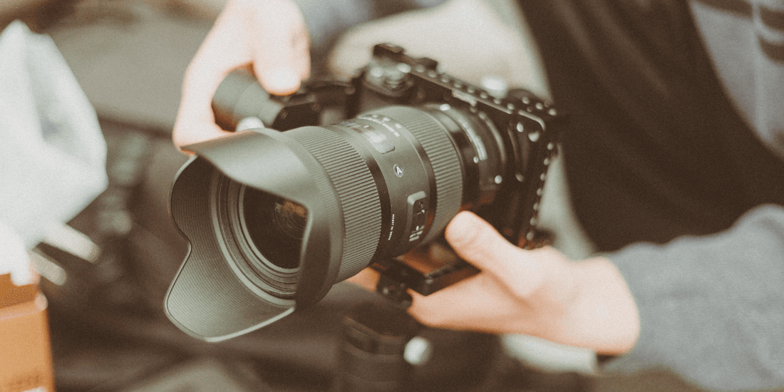 Professional photographer holding a nice camera