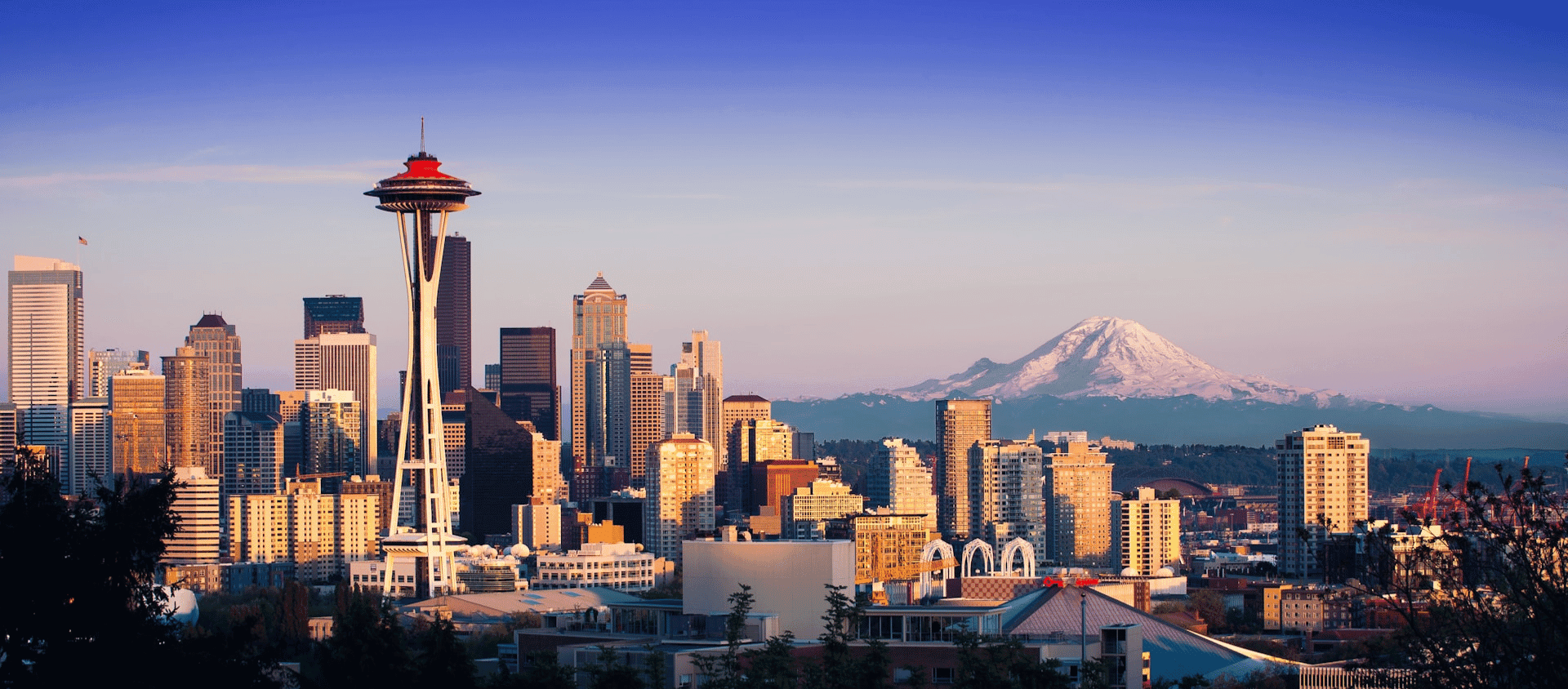 Photo of the Seattle Skyline overlooking a sunset