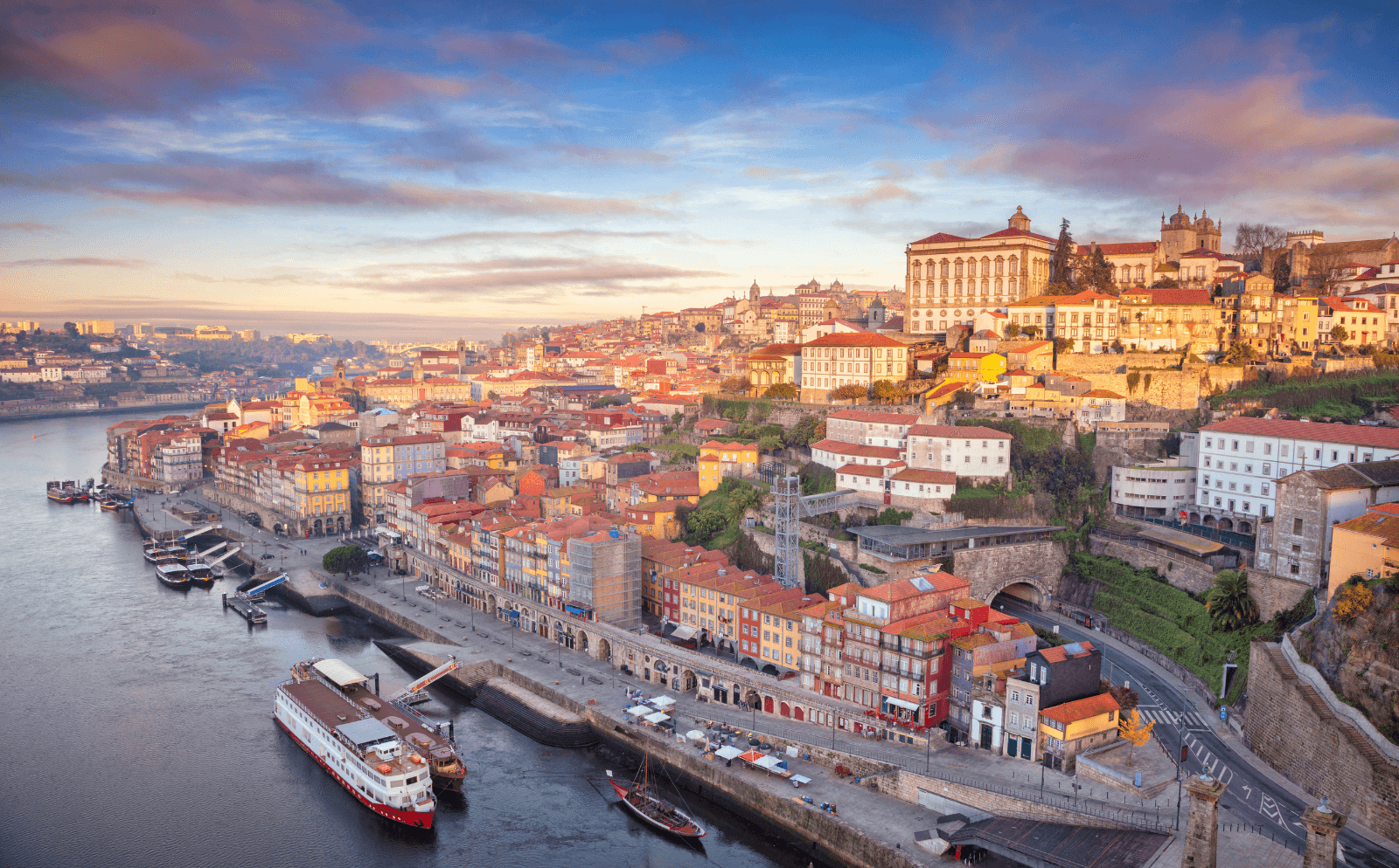 Aerial view of the riverfront in Porto, a birthday trip destination known for wine and food.