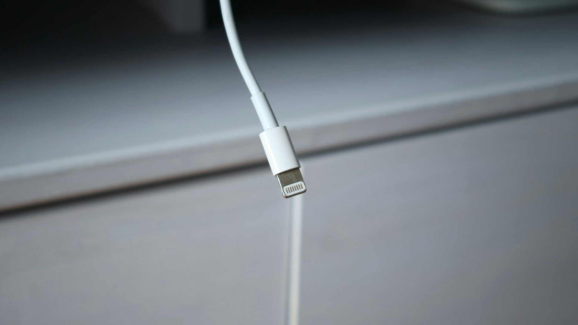White Lightning charging cable connector.