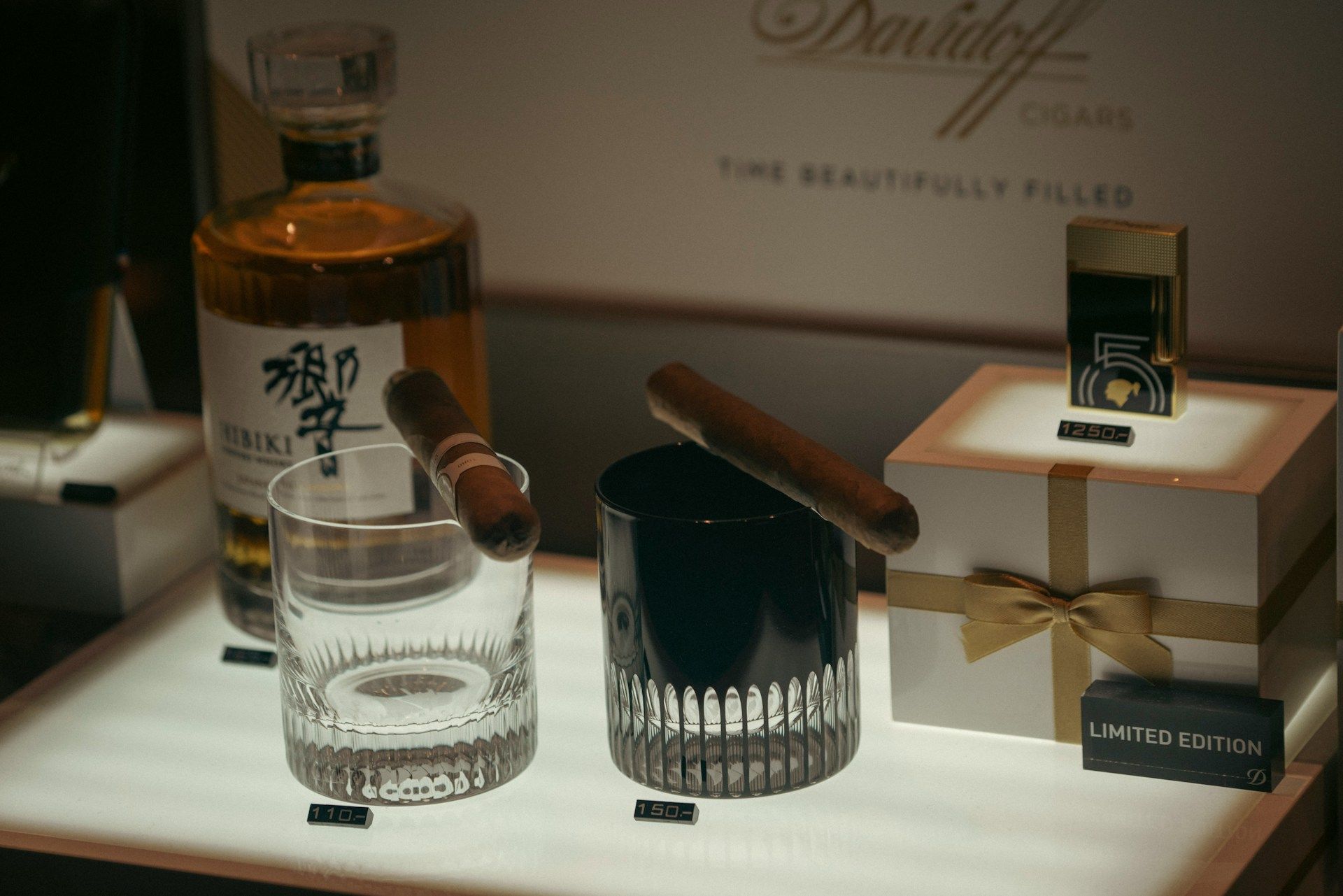 A representation of a cocktail and whisky smoker set.