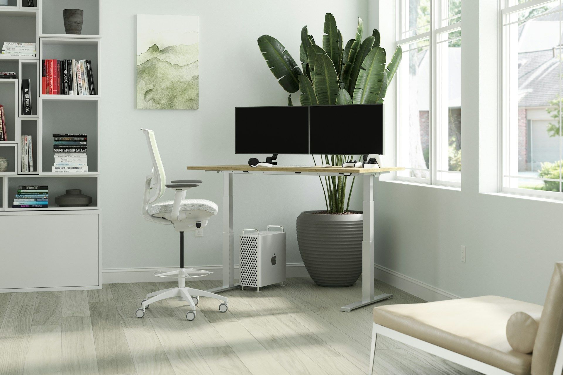 Height-adjustable standing desk with dual monitors and an ergonomic chair in a bright home office.